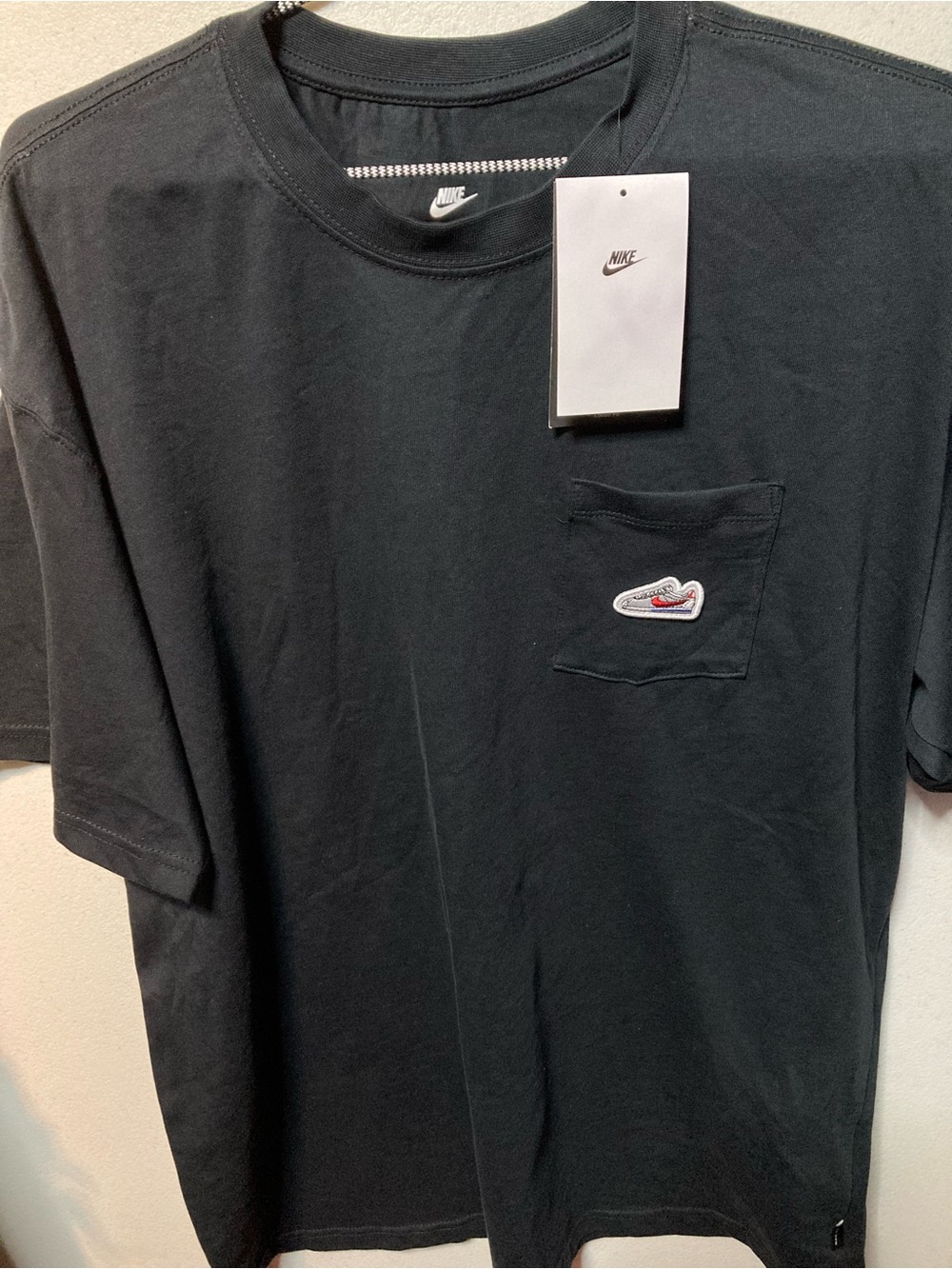 Nike Black Short-Sleeve Pocket Tee with Embroidered Swoosh Patch